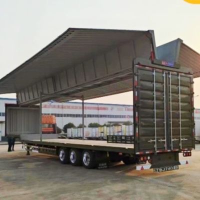 3-осевой полуприцеп с 13600x2600x4000 мм настраиваемым размахом крыльев с открывающимся крылом