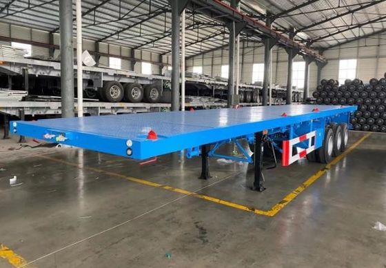 Максимальная полезная нагрузка Wosheng 30000 кг 3 оси 4 оси Стальной контейнер Плоская кровать полуприцеп