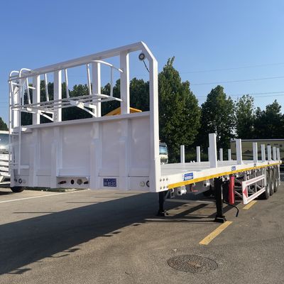 Боковые колонны плоских полуприцепов, предназначенных для перевозки деревянных катушек и стальных контейнеров