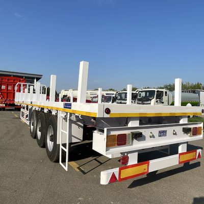 Боковые колонны плоских полуприцепов, предназначенных для перевозки деревянных катушек и стальных контейнеров